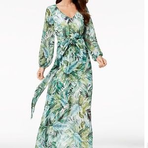 Long sleeve maxi dress, body lined to below knee,